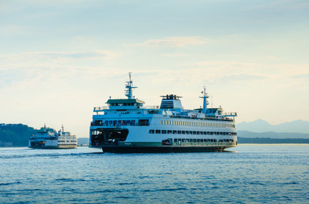 Seattle, United States, August 9, 2013 - Washington State Ferries transporting people and cars sail from Seattle to Bainbridge Island and Bremerton のeditorial素材