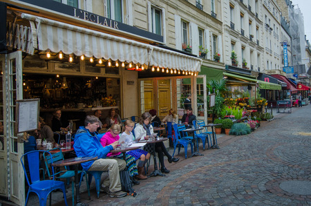 Paris, France, October 7, 2014 - A family checks out the lunch menu at an outdoor caf? in the charming Rue Cler neighborhood.のeditorial素材