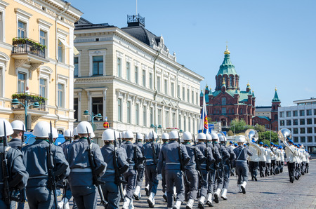 Helsinki, Finland, August 8, 2014 ? A military parade of soldiers march toward the Upenski Orthodox church in the heart of the Finnish capital.のeditorial素材