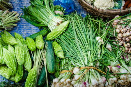 Green vegetables for sale at an outdoor market in Chan May, Vietnam.の写真素材