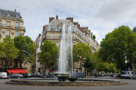 Paris, France, August 25, 2015 - Victor Hugo Plaza with its fountains honors Frances most important writer who became famous when he wrote The Hunchback of Notre-Dame published in 1831.のeditorial素材