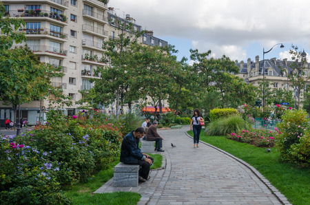 PARIS - FRANCE SEPTEMBER 3, 2015: Francoise Girard Park at Place dItalie is a well-maintained green space popular with the residents of the 13th arrondissement of Paris.のeditorial素材