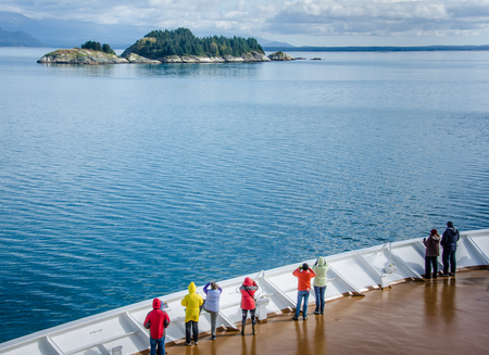 Glacier Bay, United States, September 11, 2016 - Cruise ship passengers look out for marine life while sailing in Glacier Bay National Park and Preserve in Southeast Alaska.のeditorial素材
