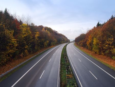 Empty German autobahn in the autumn eveningの写真素材