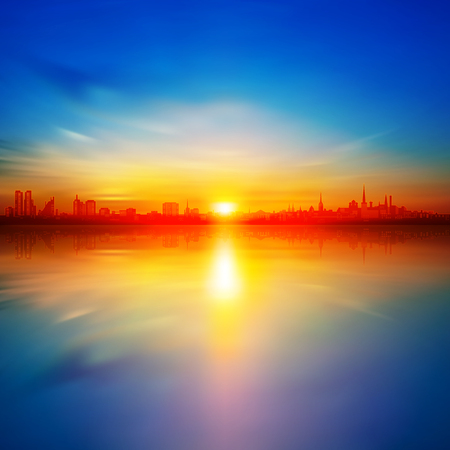 abstract background with gold spring sunrise and silhouette of cityのイラスト素材