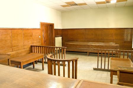 Old vintage court room with wooden furnitures.の写真素材
