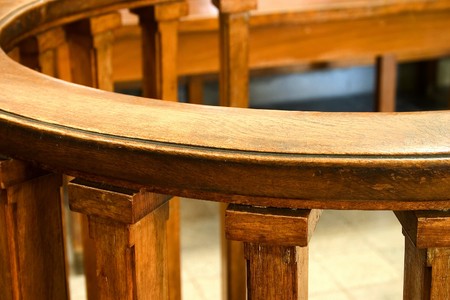 Wooden court bench. Vintage style court room close up.の写真素材