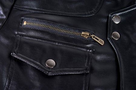Close up of black leather jacket. Pocket and zipper.の写真素材