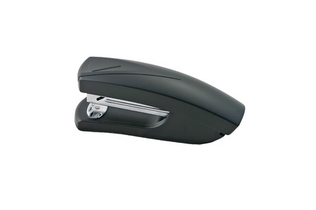 Black office stapler isolated on white background.の写真素材