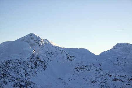 Winter mountain peak in the sunny day.の写真素材