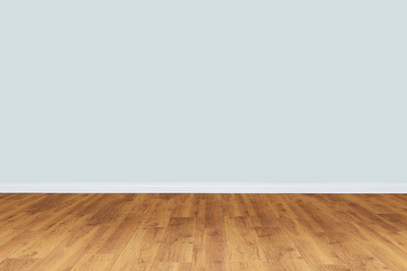 Empty gray wall room with wooden floorの写真素材