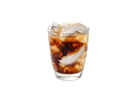 Ice coffee in glass isolated on white background, clipping path included.