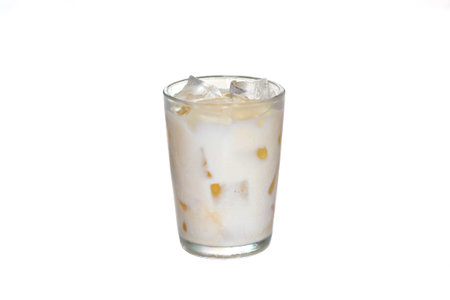 Ice coffee with milk in a glass isolated on white backgroundの写真素材