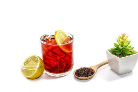 Cuba libre with ice and lemon isolated on white backgroundの写真素材