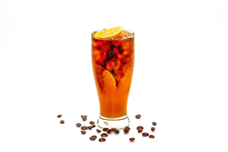Iced tea with orange and coffee beans isolated on white background.