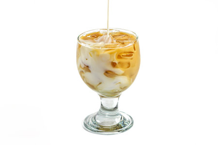 Iced coffee in a glass isolated on a white background, clipping path