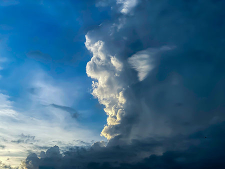 Dramatic stormy sky with dark and light cumulus clouds