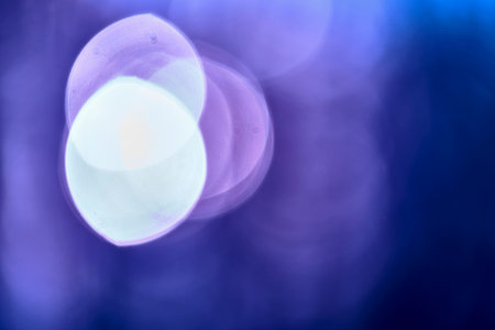 glare of light in out of focus blue color