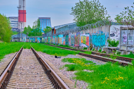 abandoned railway tracks in an industrial zone