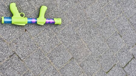 toy gun lies on the spenderの写真素材