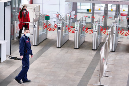 Russia Moscow Cherkizovskaya metro station June 2020. security officer in a medical mask at the...