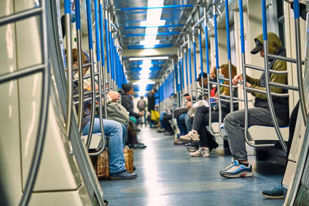 Russia Moscow June 2020. Moscow metro. people in protective masks ride in a subway car. coronavirus epidemic in Russia. viral risk of infection. colorのeditorial素材