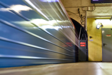 Russia Moscow June 2020. Moscow metro. effect of long exposure of the metro train movement. on the platform are people in protective masks. coronavirus epidemic in Russia. viral risk of infection. colorのeditorial素材