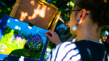Artist paints a picture in a parkのeditorial素材