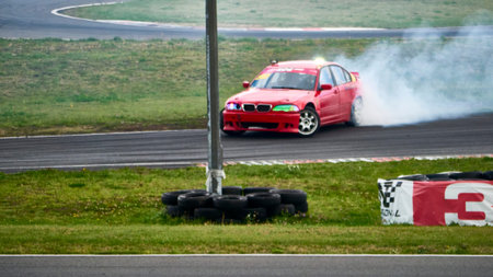 Russia Ryazan International Track Atron September 2020. A sports car in a controlled skid on the track. Smoke billows from under the wheelsのeditorial素材