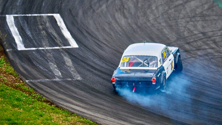 Russia Ryazan International Track Atron September 2020. A sports car in a controlled skid on the track. Smoke billows from under the wheelsのeditorial素材