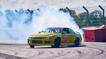 Russia Ryazan International Track Atron September 2020. A sports car in a controlled skid on the track. Smoke billows from under the wheelsのeditorial素材