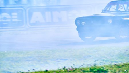 Russia Ryazan International Track Atron September 2020. A sports car in a controlled skid on the track. Smoke billows from under the wheelsのeditorial素材