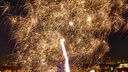 fireworks in the sky over the city. low light. short exposureの写真素材