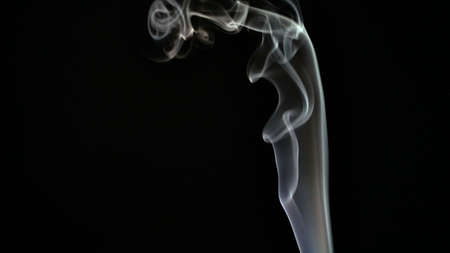 Smoke isolated on dark backgroundの写真素材