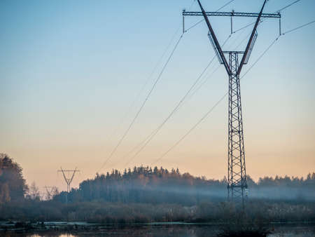 Rural landscape, the wires go into the mist. Russia, Moscow regionの写真素材