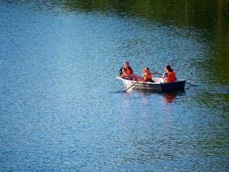 Moscow, summer 2021 family boating in the city park