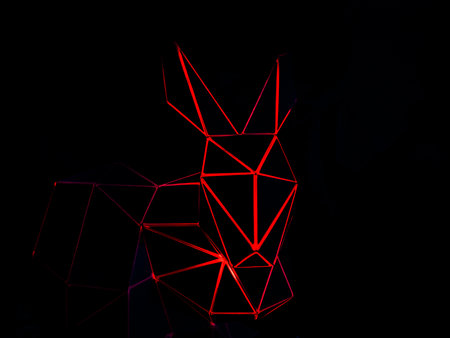 polygonal figure of a rabbit. low light photoの写真素材