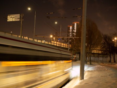 tram in a blurry form in the night city center , Moscow, Russia. low light shootの写真素材