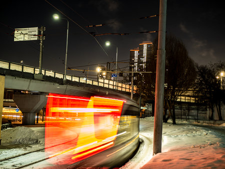 tram in a blurry form in the night city center , Moscow, Russia. low light shootの写真素材