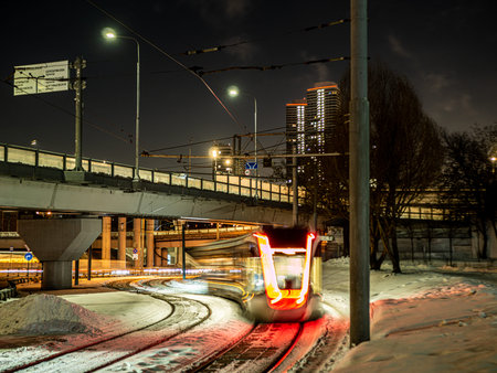 tram in a blurry form in the night city center , Moscow, Russia. low light shootの写真素材