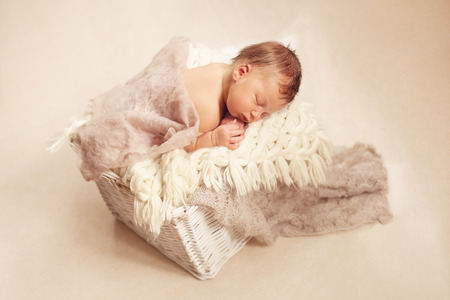 healthy newborn baby one week old sleepingの写真素材