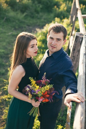 Beautiful young loving couple enjoing good weather in summerの写真素材