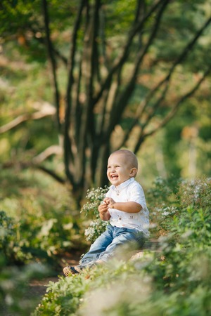 Happy little boy outsideの写真素材