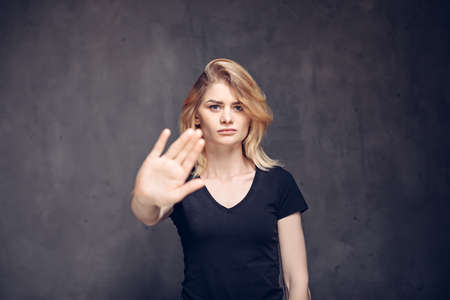 Young caucasian woman show stop gestureの写真素材