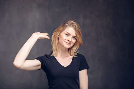 Young caucasian woman with high five gestureの写真素材