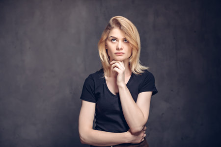 Pensive young caucasian woman