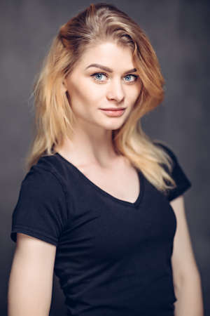 Portrait of smiling young caucasian womanの写真素材