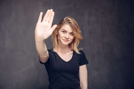 Young caucasian woman with high five gestureの写真素材