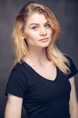 Portrait of smiling young caucasian womanの写真素材