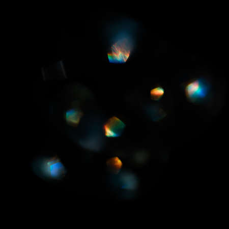 Abstract blurred color light spots. Lens, glass or crystals flare bokehの写真素材